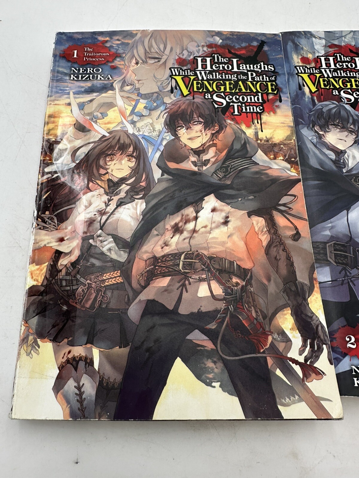 The Hero Laughs While Walking the Path of Vengeance a Second Time Vol. 1 + 2