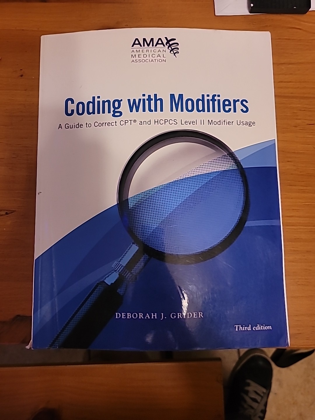 Coding with Modifiers : A Guide to Correct CPT and HCPCS Level II Modifier Usage